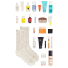 Revolve Advent Calendar 2025 with 25 luxury beauty treats including skincare, makeup, haircare, body care and cosy socks for beauty lovers.