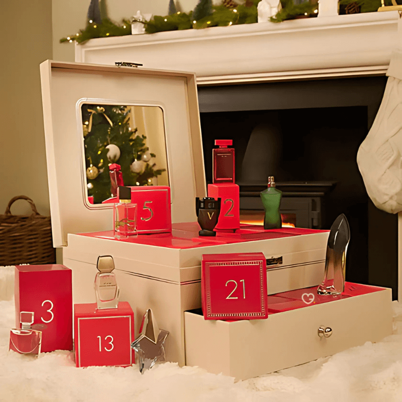 The Perfume shop Advent Calendar 2025 in a red festive box with 24 luxury mini perfumes and built‑in mirror.