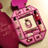 Victoria's Secret Advent Calendar 2025 in pink festive box with 12 Bombshell perfumes, glosses and mini accessories.