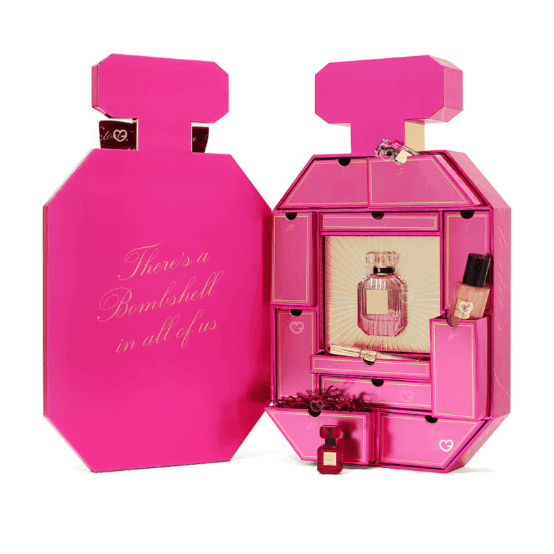 Victoria's Secret Advent Calendar 2025 in pink festive box with 12 Bombshell perfumes, glosses and mini accessories.