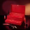 Christian Louboutin Advent Calendar 2026 open on a burgundy background