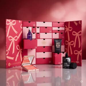 Glossybox Advent Calendar 2026 opened showing beauty products including Medik8 and Huda Beauty