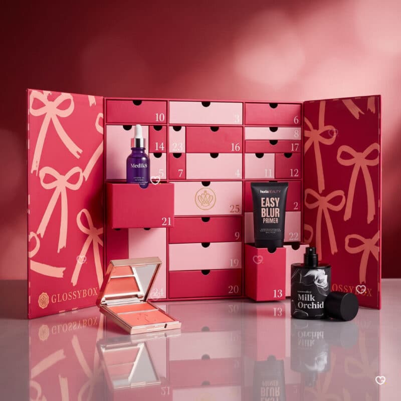 Glossybox Advent Calendar 2026 opened showing beauty products including Medik8 and Huda Beauty