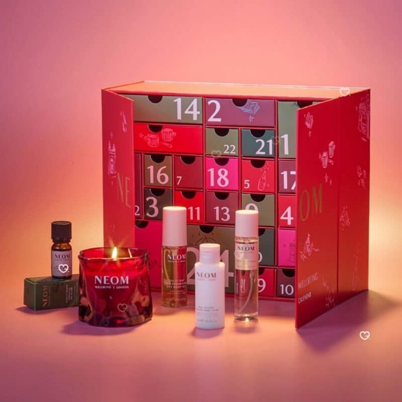 Neom Advent Calendar 2026 opened box drawers with candle and body oil, wellbeing advent calendar