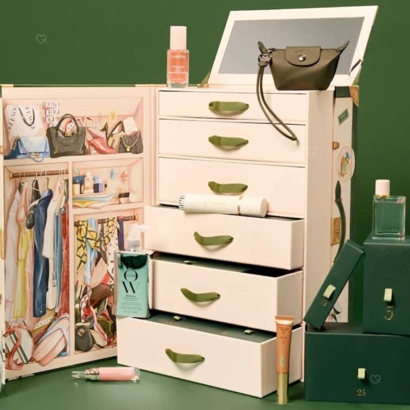 Vogue Festive Calendar 2026 open trunk with luxury full-size beauty products on display