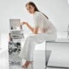 Woman using 111Skin skincare from the advent calendar for women 2026