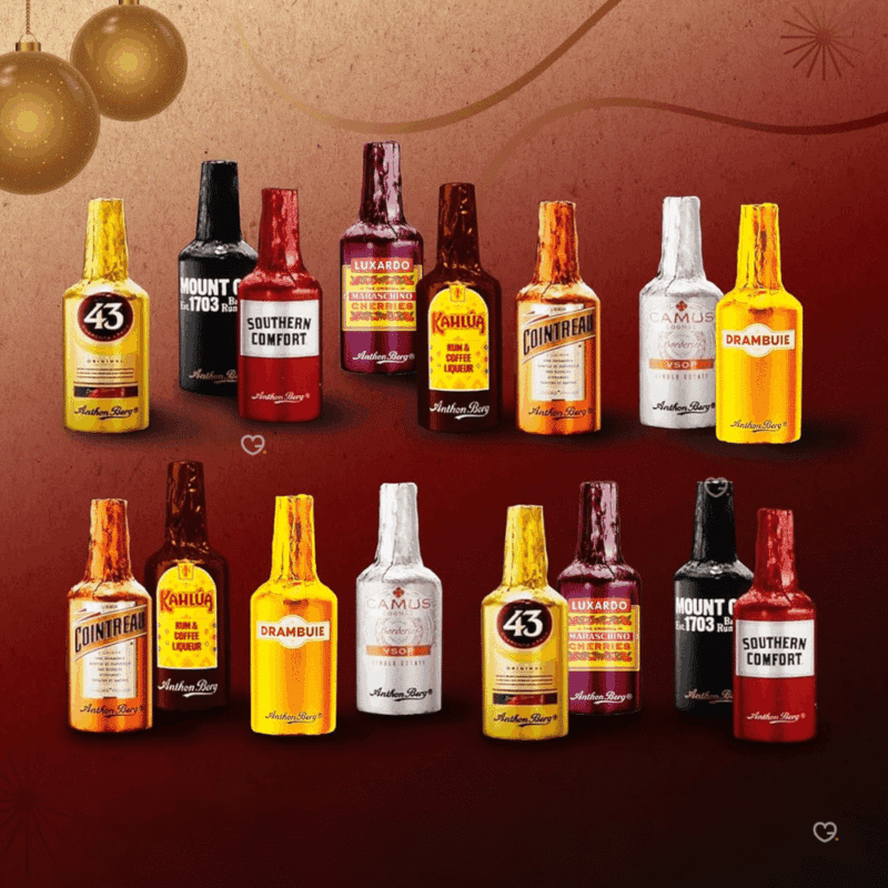 Anthon Berg Advent Calendar 2025 with 24 dark chocolate liquor bottles filled with rum, whisky, vodka, and cognac—perfect for adults who enjoy gourmet spirits.