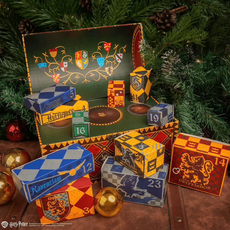 Harry Potter Deluxe Quiddtich Advent Calendar 2025 with 24 themed gifts like socks, keychain, and Golden Snitch items for collectors and fans.