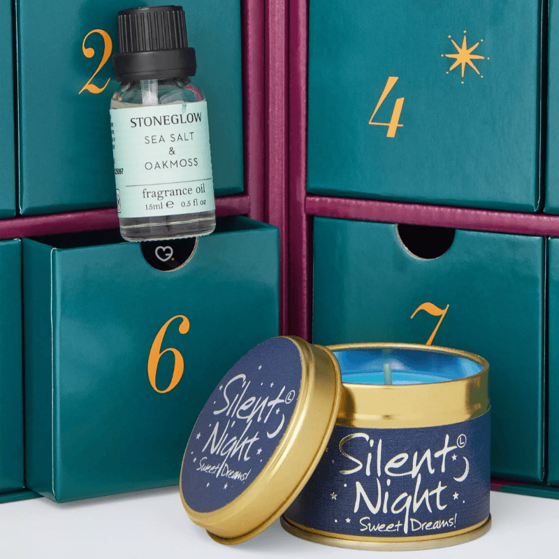 John Lewis Candle Advent Calendar 2025 featuring 12 luxury scented candles and oils in festive packaging, perfect for home fragrance lovers.