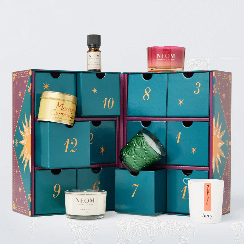 John Lewis Candle Advent Calendar 2025 featuring 12 luxury scented candles and oils in festive packaging, perfect for home fragrance lovers.