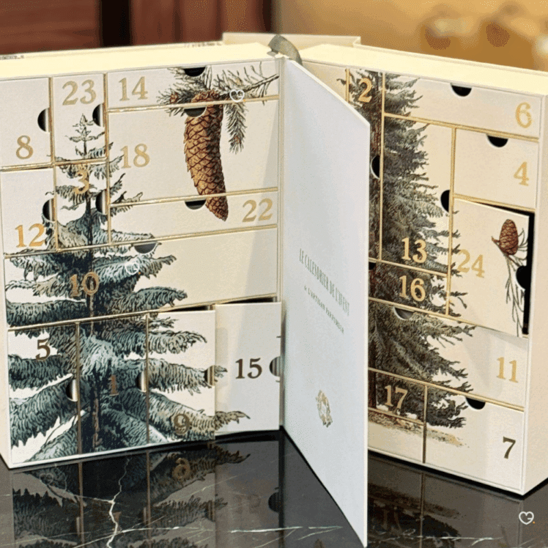 L'Artisan Parfumeur Advent Calendar 2025 with 24 perfumes, body care and home accessories in a festive box for luxury fragrance lovers.
