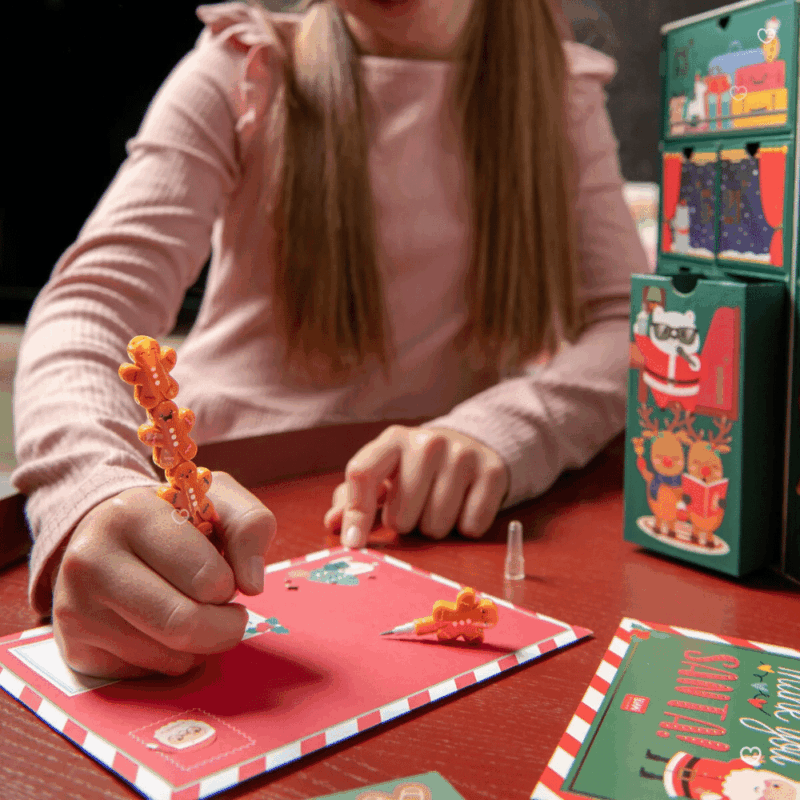 Legami Advent Calendar 2025 with 24 stationery surprises in a glittery reusable train-shaped box, perfect for creative adults.