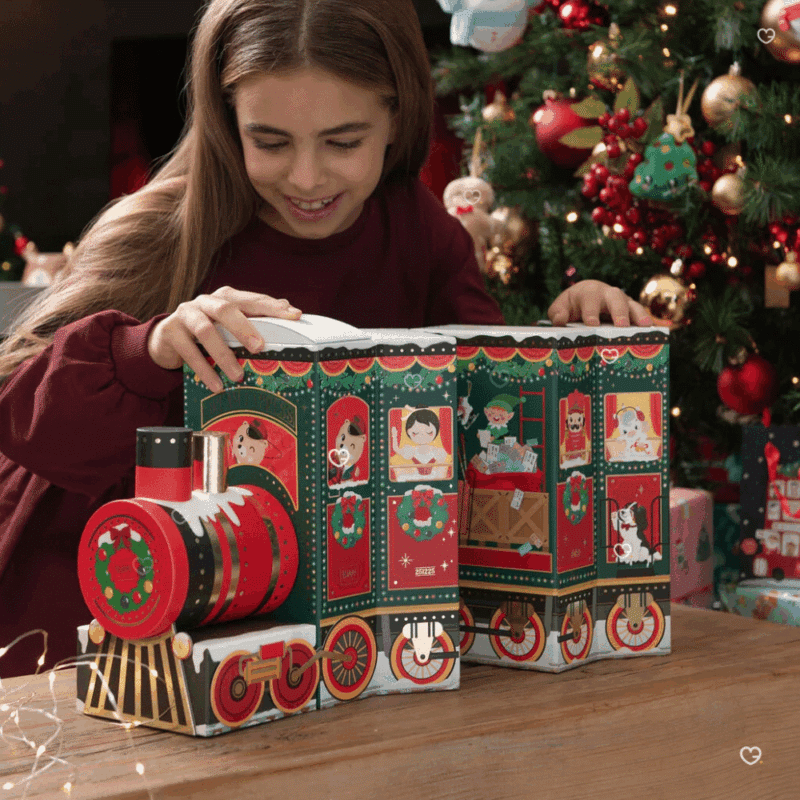 Legami Advent Calendar 2025 with 24 stationery surprises in a glittery reusable train-shaped box, perfect for creative adults.