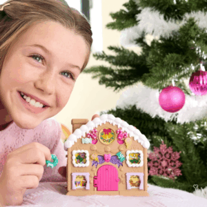 Polly Pocket Advent Calendar 2025 with 24 festive surprises, mini Polly figurine and gingerbread house playset for kids’ holiday fun.