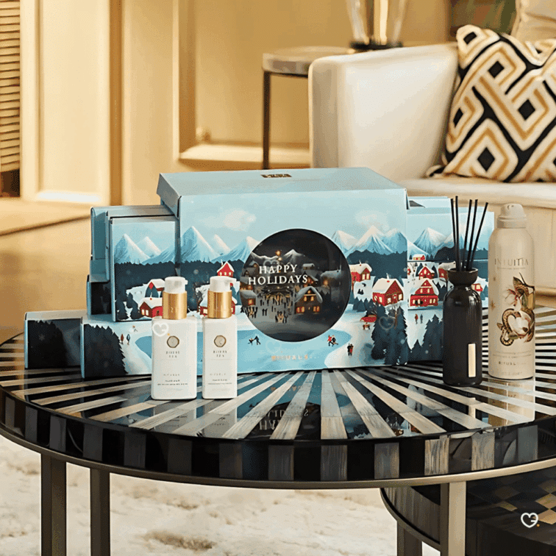 Rituals Deluxe Advent Calendar 2025 with 24 luxury beauty and wellness treats in festive gold diorama design, ideal for self-care lovers.