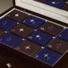 Close-up of the numbered star-shaped doors on the Astrid & Miyu 2026 gold advent calendar