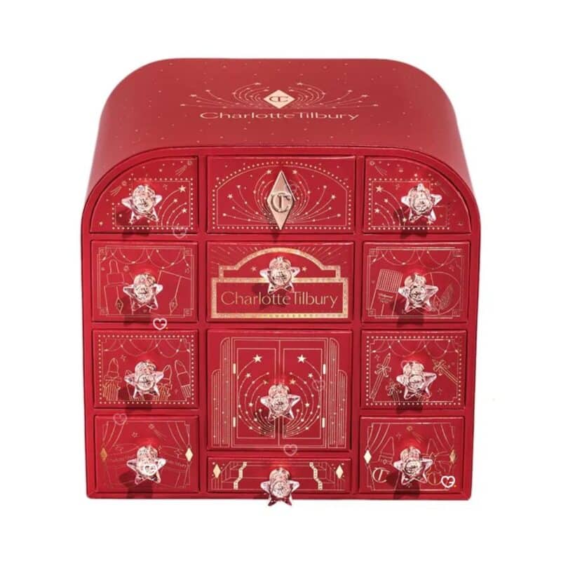 Front of the Charlotte Tilbury Advent Calendar 2026 with 12 jewel-handled drawers and crystal star pulls