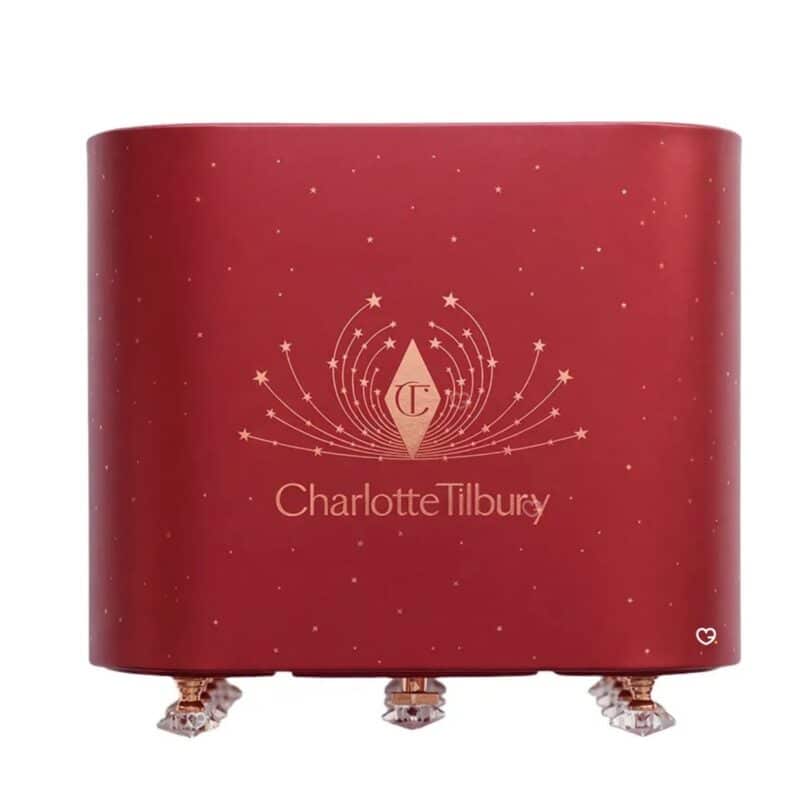 Back of the Charlotte Tilbury Advent Calendar 2026 red and gold keepsake box on crystal star feet