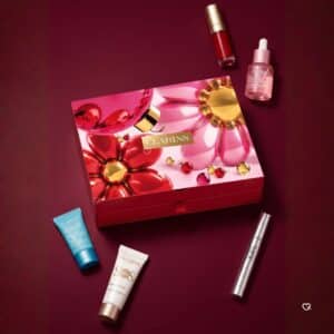 Clarins Advent Calendar 2026 box with skincare and make-up minis on burgundy