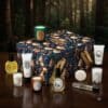 Diptyque luxury advent calendar 2026 with products in a festive setting.