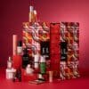 ELLE Beauty Advent Calendar 2026 open, numbered drawers with beauty products spread out, advent calendar for women