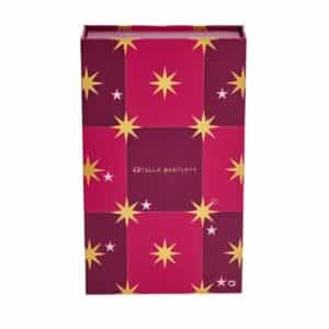 Estella Bartlett Advent Calendar 2026 closed book-style box with gold stars