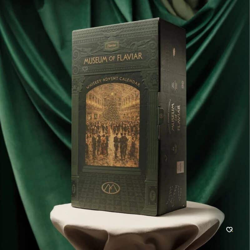 Flaviar Advent Calendar 2026 gift set displayed on green velvet