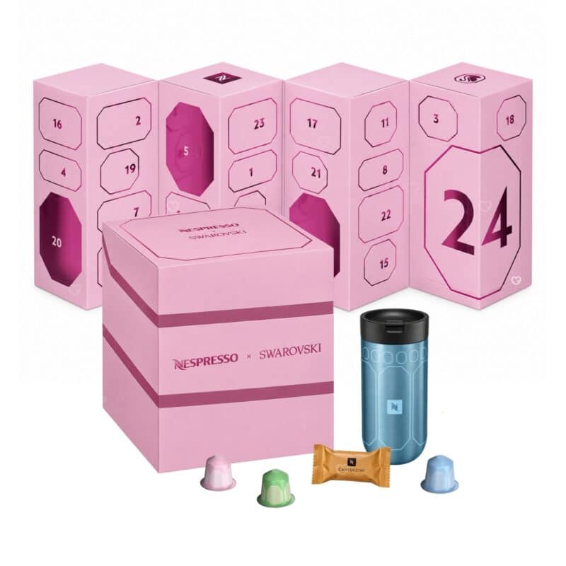 Nespresso x Swarovski advent calendar 2026 open box showing 24 numbered doors and the travel mug