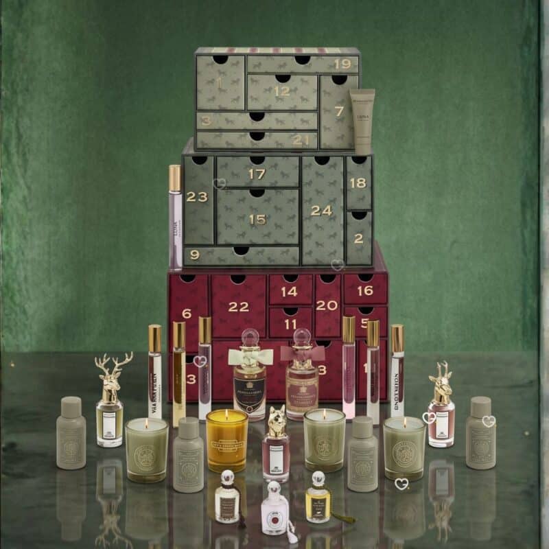 Penhaligon's Advent Calendar 2026 open box with fragrances and lit scented candles