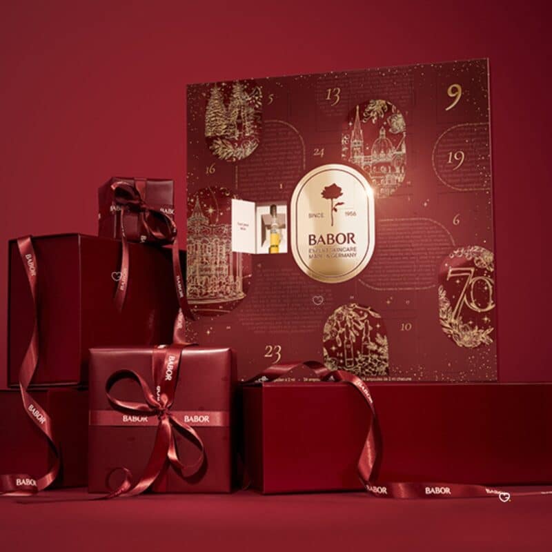 Babor Advent Calendar 2026 styled as a gift with wrapped boxes and ribbons