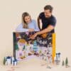 Couple opening the Degusta Box XXL food advent calendar 2026 at home in December
