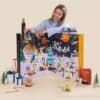 Degusta Box food advent calendar 2026 with full-size treats in the foreground, illustrative image as the 2026 line-up is not disclosed