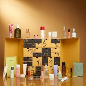 Harvey Nichols Advent Calendar 2026 open with all drawers and beauty products on a gold background