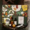 L'Occitane Advent Calendar 2026 with shower gels and soaps arranged in front of the box