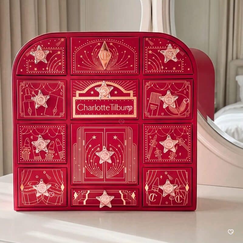 Charlotte Tilbury Advent Calendar 2026 on a white console table in front of a mirror