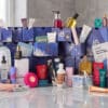 Contents of the John Lewis Beauty Advent Calendar 2026 laid out, 23 full-size beauty products