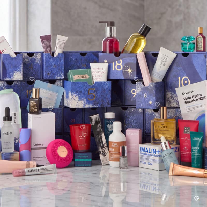 Contents of the John Lewis Beauty Advent Calendar 2026 laid out, 23 full-size beauty products