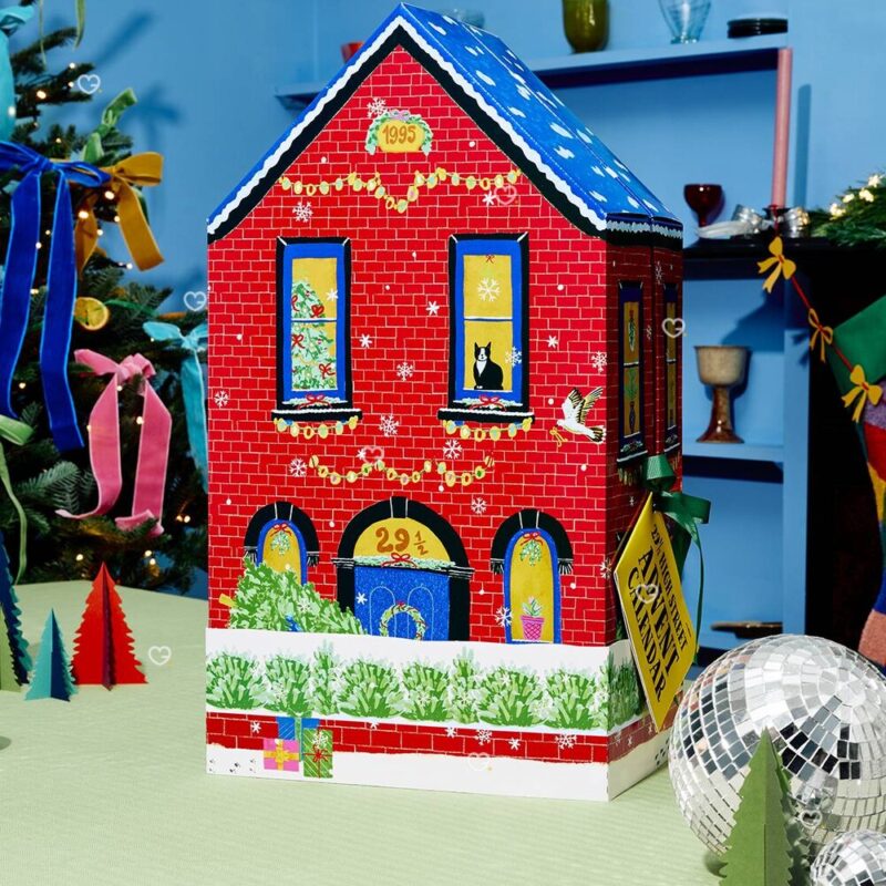 Lush 29½ High Street advent calendar house box in a festive blue room with disco balls