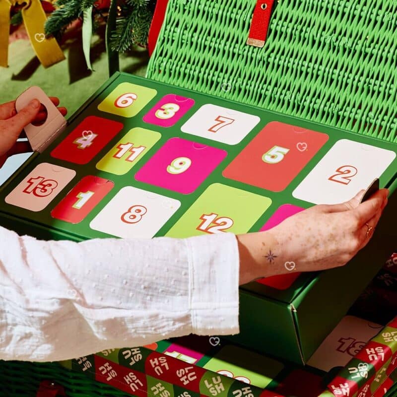 Numbered advent doors inside the Lush wicker hamper 2026