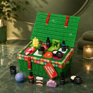 Lush cosmetics advent calendar open showing the numbered tray and festive products