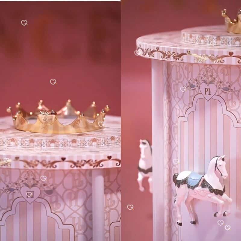 Close-up of the P.Louise advent calendar carousel crown and horse