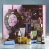Anthropologie 24 Days of Beauty Advent Calendar 2026 opened, showing the illustrated box and its full-size beauty products