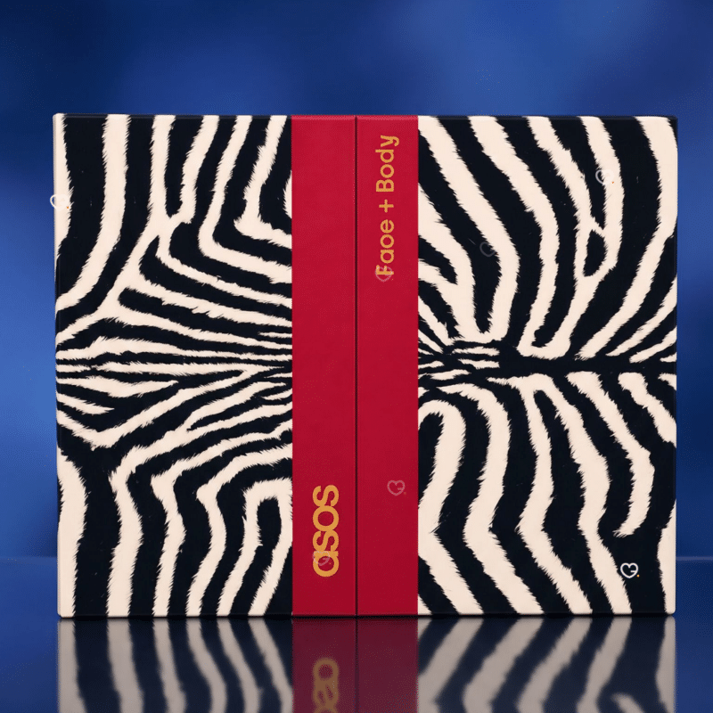 ASOS Face + Body Advent Calendar 2026 zebra-print box front on a blue background