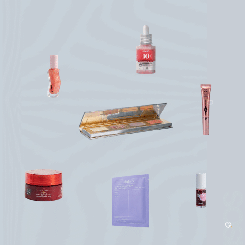 Flat lay of ASOS Advent Calendar 2026 products including the Psychic Sisters candle and serums