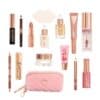 The full contents of the Charlotte Tilbury Hollywood Beauty Wonderland Advent Calendar 2026, fifteen products laid out