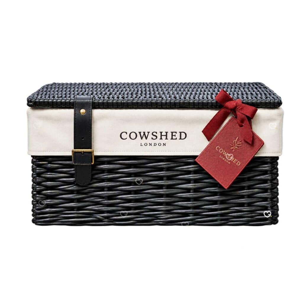 Cowshed Advent Calendar 2026 handwoven wicker hamper with bordeaux gift tag