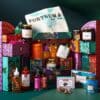 Fortnum's Feasting Advent Calendar 2026 open box with kitchen tea towel and products