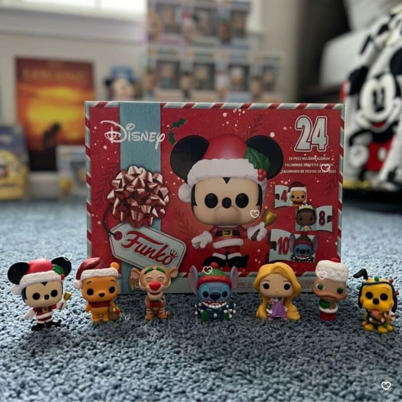 Funko Pocket Pop Disney figures lined up beside the 2026 advent calendar box