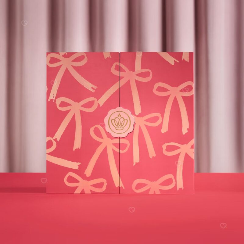 Glossybox Advent Calendar 2026 closed pink box with bow-print drawers