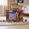 LEGO Star Wars 75456 Advent Calendar box on a bedroom rug with built Mandalorian minifigures